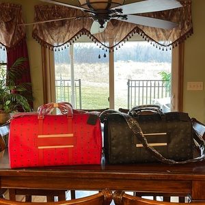 MCM overnight bags (2) 1 red 1 black
